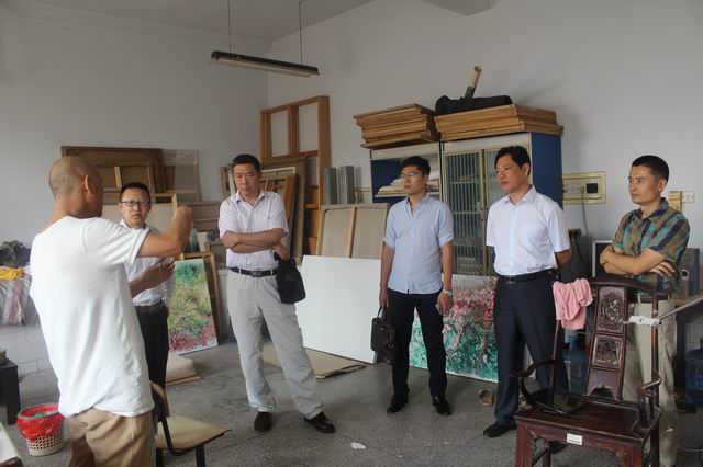 山东省美术馆副馆长、著名画家王建国一行应邀来竟博电竞官网参观交流